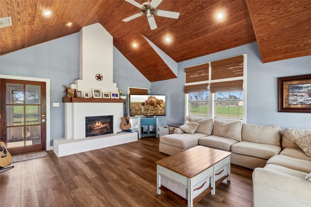 living room featuring dark hardwood / wood-style flooring, high vaulted ceiling, ceiling fan, and wood ceiling