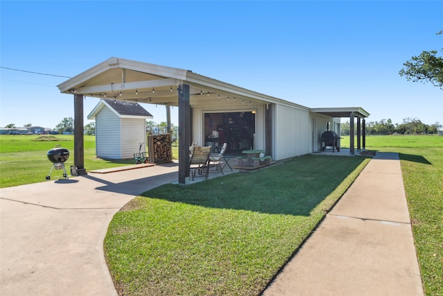 3110 Jack Beaver Rd, Santa Fe, TX 77517 - exterior space with a storage shed and a lawn