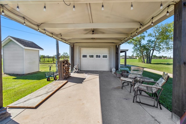 3110 Jack Beaver Rd, Santa Fe, TX 77517 - view of patio with a storage shed and a garage