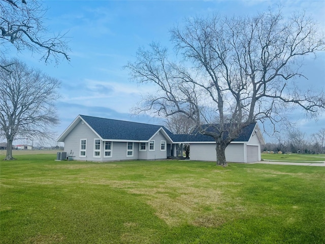 3110 Jack Beaver Rd, Santa Fe, TX 77517 - ranch-style home with a garage, cooling unit, and a front lawn