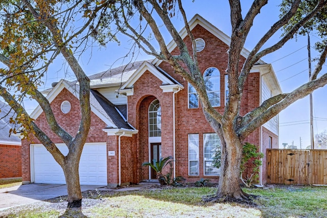 front of property with a garage