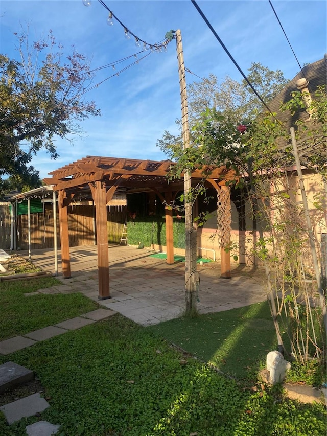 view of home's community with a pergola and a patio area