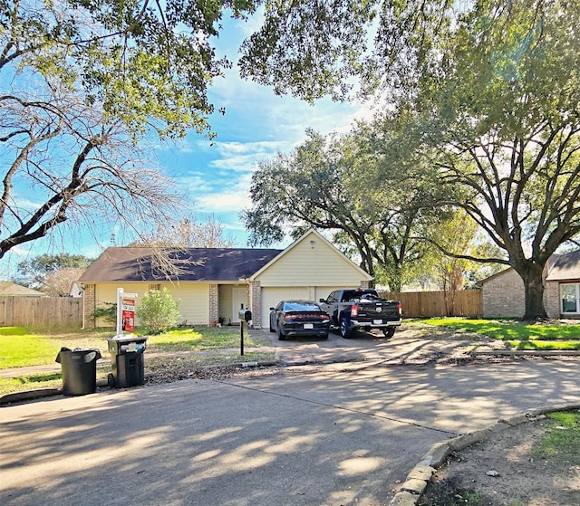 ranch-style home with a garage