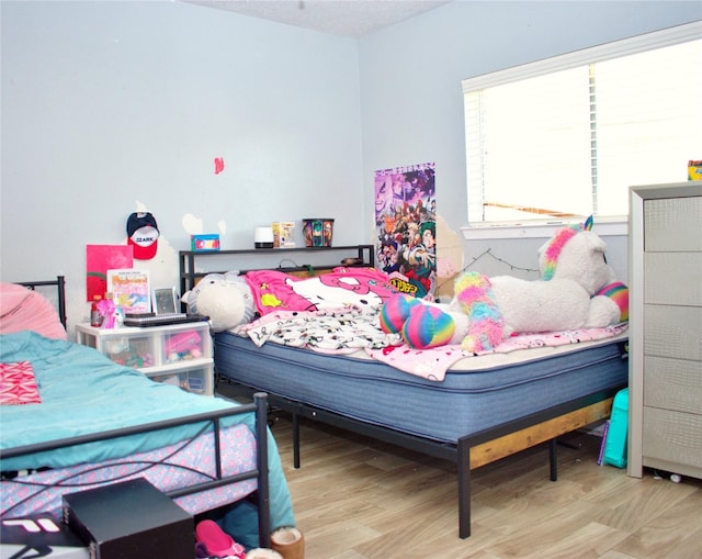 bedroom featuring light hardwood / wood-style flooring