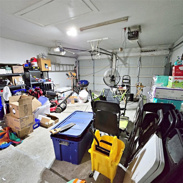 garage featuring a garage door opener