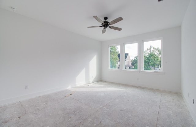 empty room featuring ceiling fan