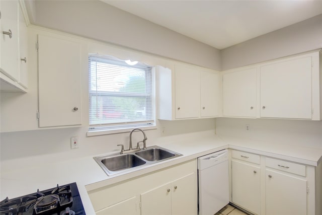 kitchen featuring white cabinetry, dishwasher, black gas stovetop, and sink