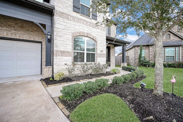 doorway to property featuring a garage