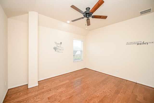 unfurnished room featuring ceiling fan, light hardwood / wood-style floors, and lofted ceiling