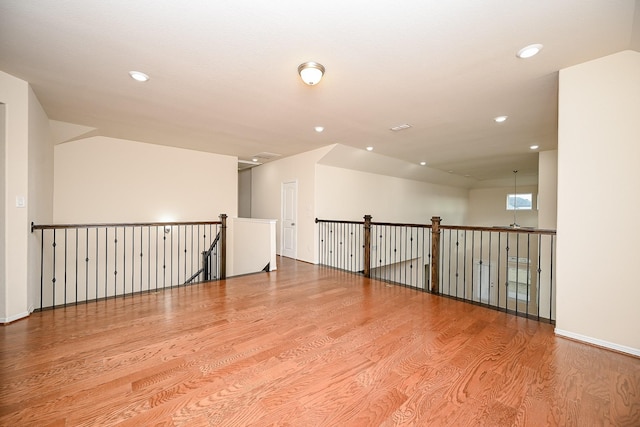 unfurnished room with light hardwood / wood-style flooring