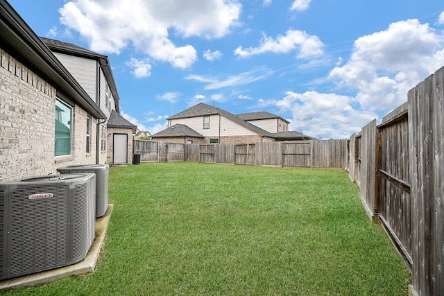 view of yard featuring central AC unit