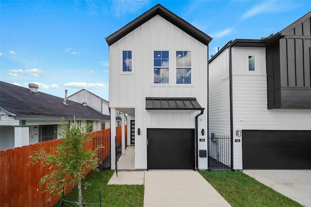 view of front of property featuring a garage