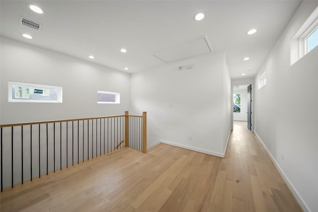 hallway featuring light wood-type flooring