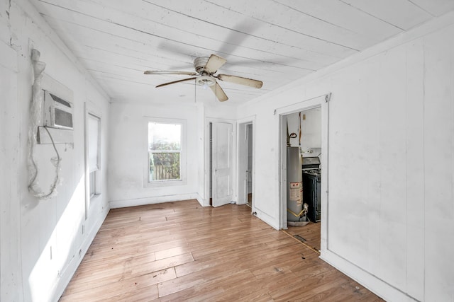 unfurnished bedroom with ceiling fan, light hardwood / wood-style floors, wooden ceiling, and water heater