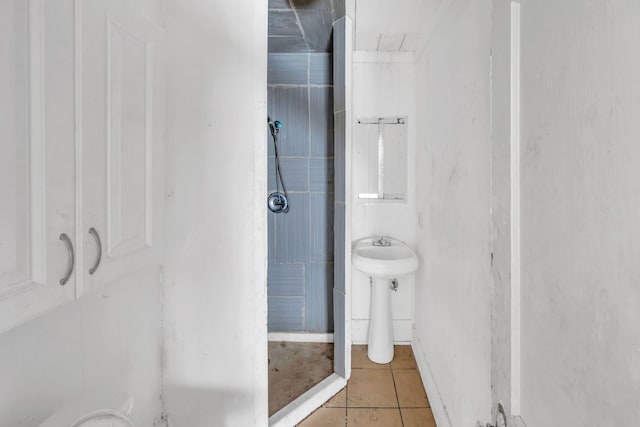 bathroom with tile patterned flooring