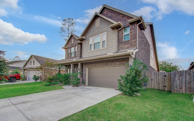 view of front of house featuring a garage and a front lawn