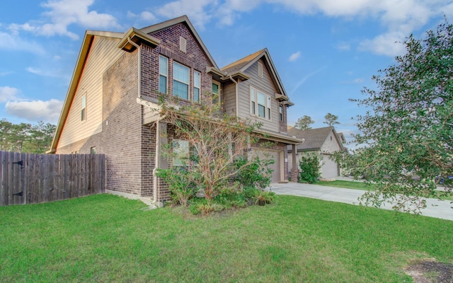 view of front of house with a garage and a front yard