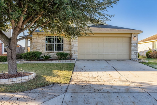 ranch-style home featuring a garage and a front lawn