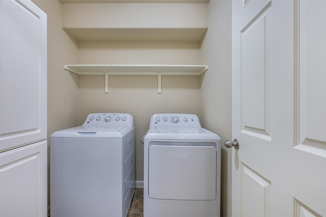 laundry room featuring washing machine and dryer