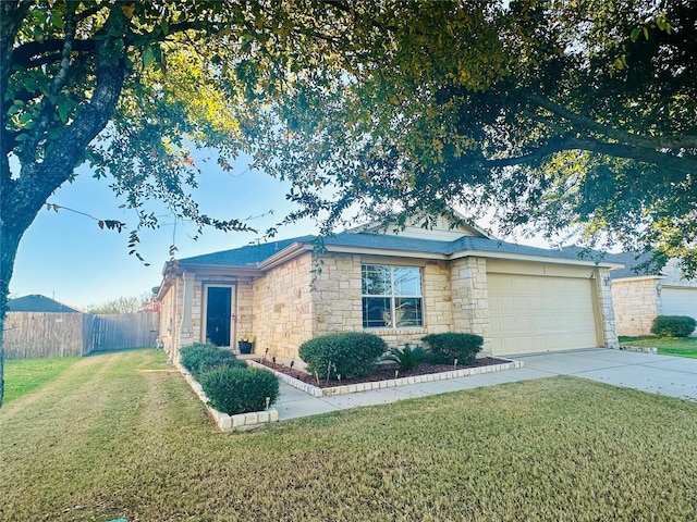 ranch-style house with a front yard and a garage