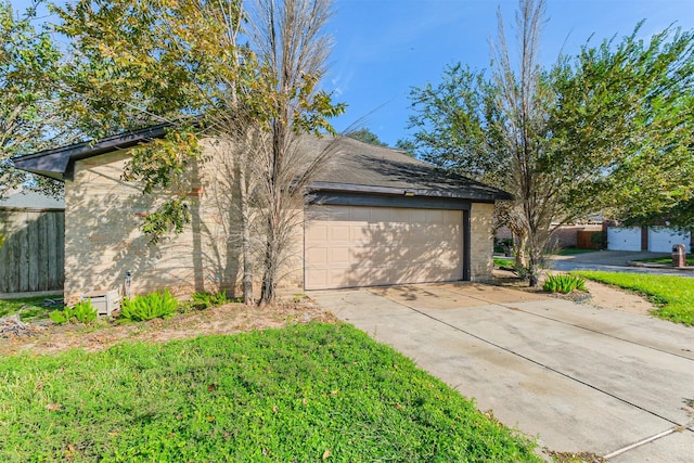 view of property exterior with a garage