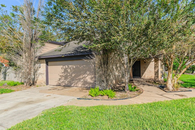 obstructed view of property featuring a garage