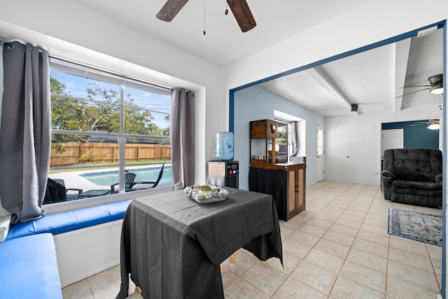 dining space with light tile patterned floors and plenty of natural light