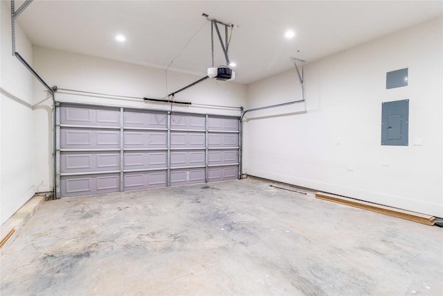 garage featuring electric panel and a garage door opener