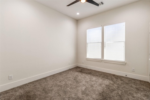 carpeted empty room with ceiling fan