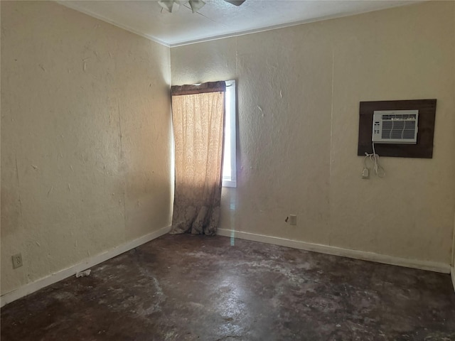 unfurnished room featuring ornamental molding and a wall mounted AC