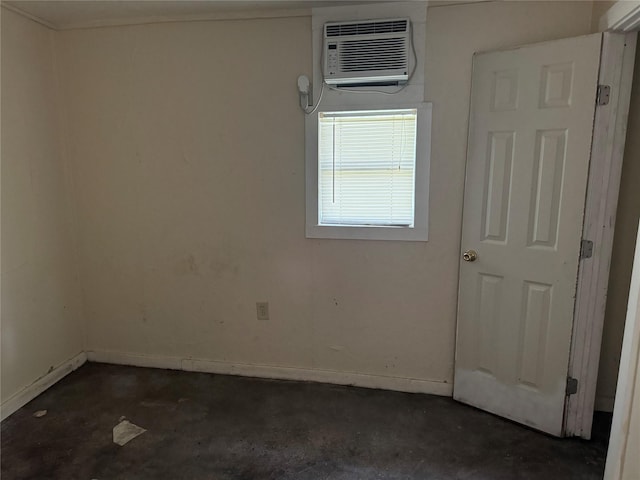 spare room featuring a wall unit AC