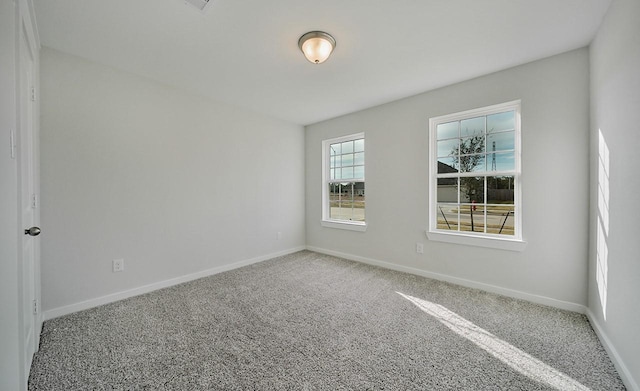 spare room with carpet flooring