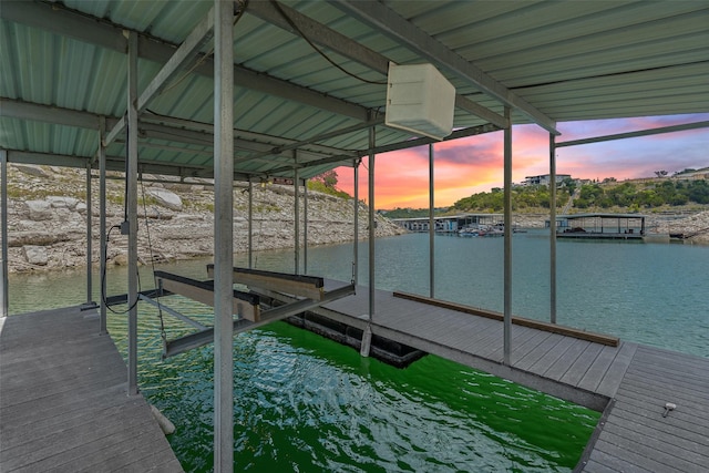 view of dock with a water view