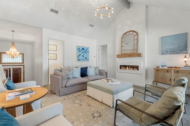 living room with beam ceiling, high vaulted ceiling, a chandelier, and light wood-type flooring