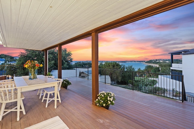 deck at dusk with a water view