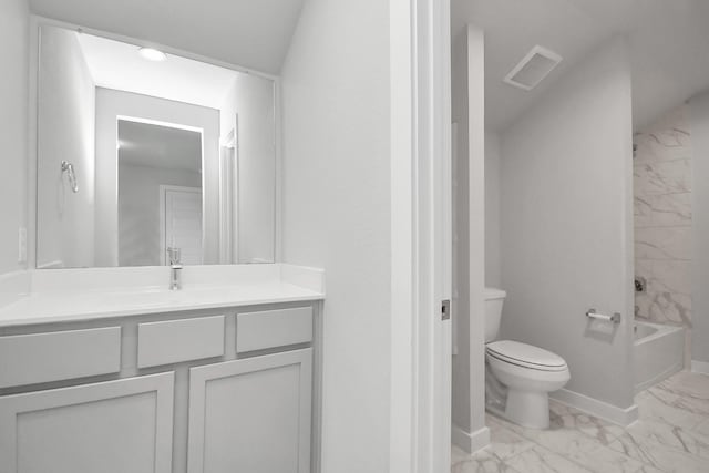 full bathroom featuring vanity, toilet, and tiled shower / bath