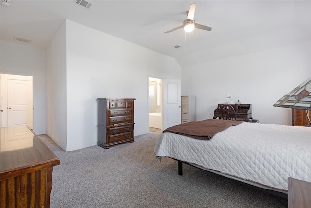 carpeted bedroom with ensuite bathroom and ceiling fan