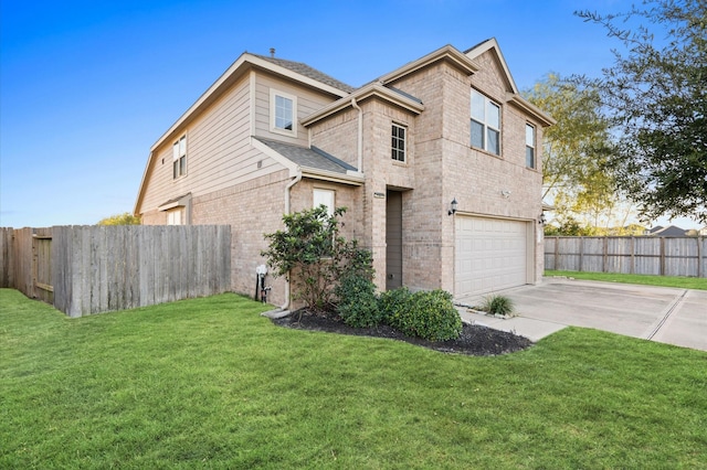 view of home's exterior featuring a yard and a garage