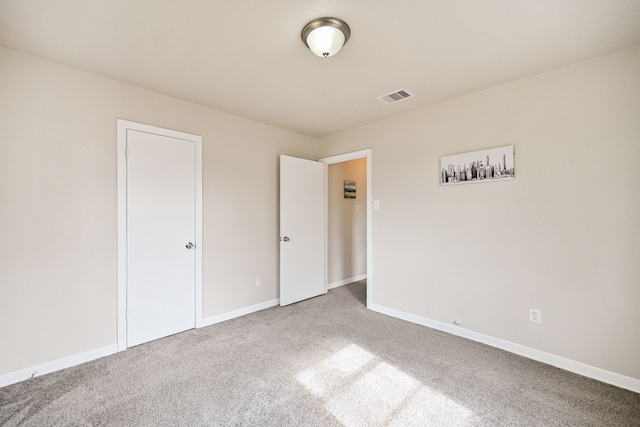 unfurnished bedroom with carpet flooring