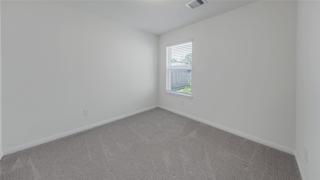 empty room with carpet flooring