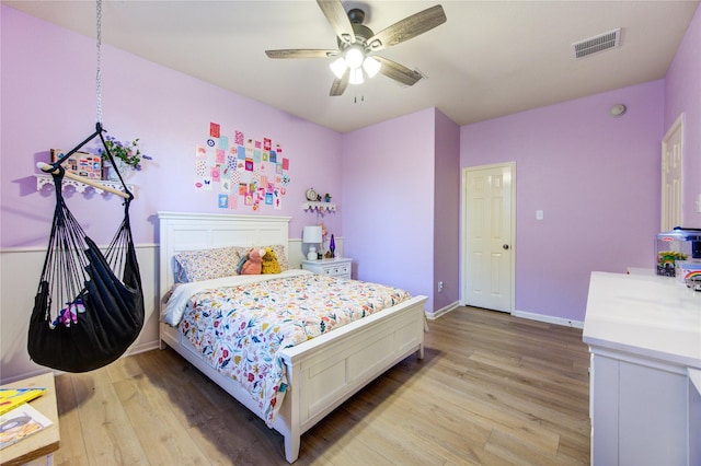 bedroom featuring ceiling fan and light wood-type flooring