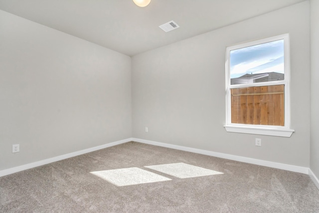 view of carpeted spare room