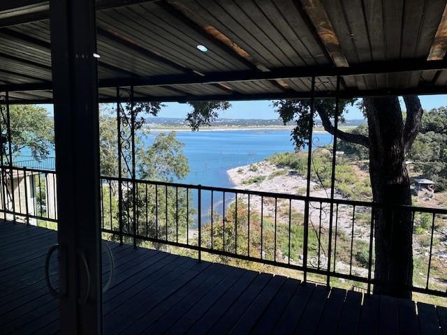 deck featuring a water view