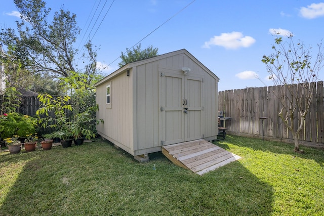 view of outdoor structure featuring a yard