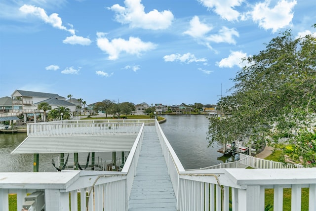 dock area with a water view