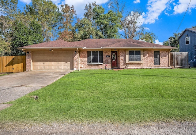 ranch-style house with a front yard and a garage