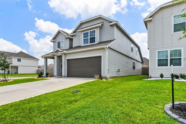 view of front facade with a front lawn and a garage