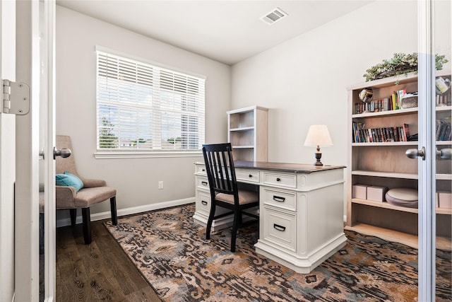 home office featuring french doors and dark hardwood / wood-style floors