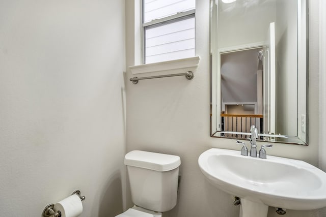 bathroom with sink and toilet