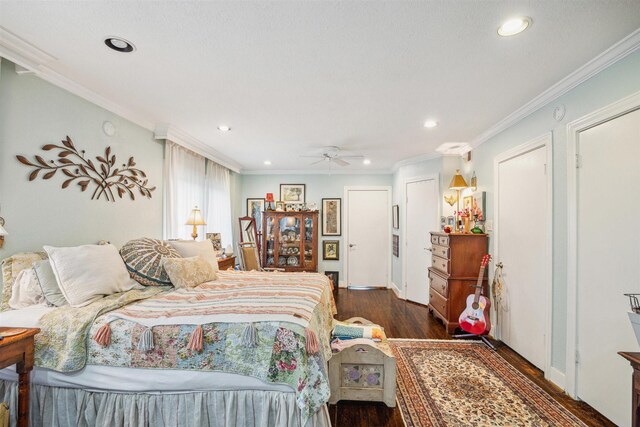 bedroom featuring dark hardwood / wood-style floors and crown molding